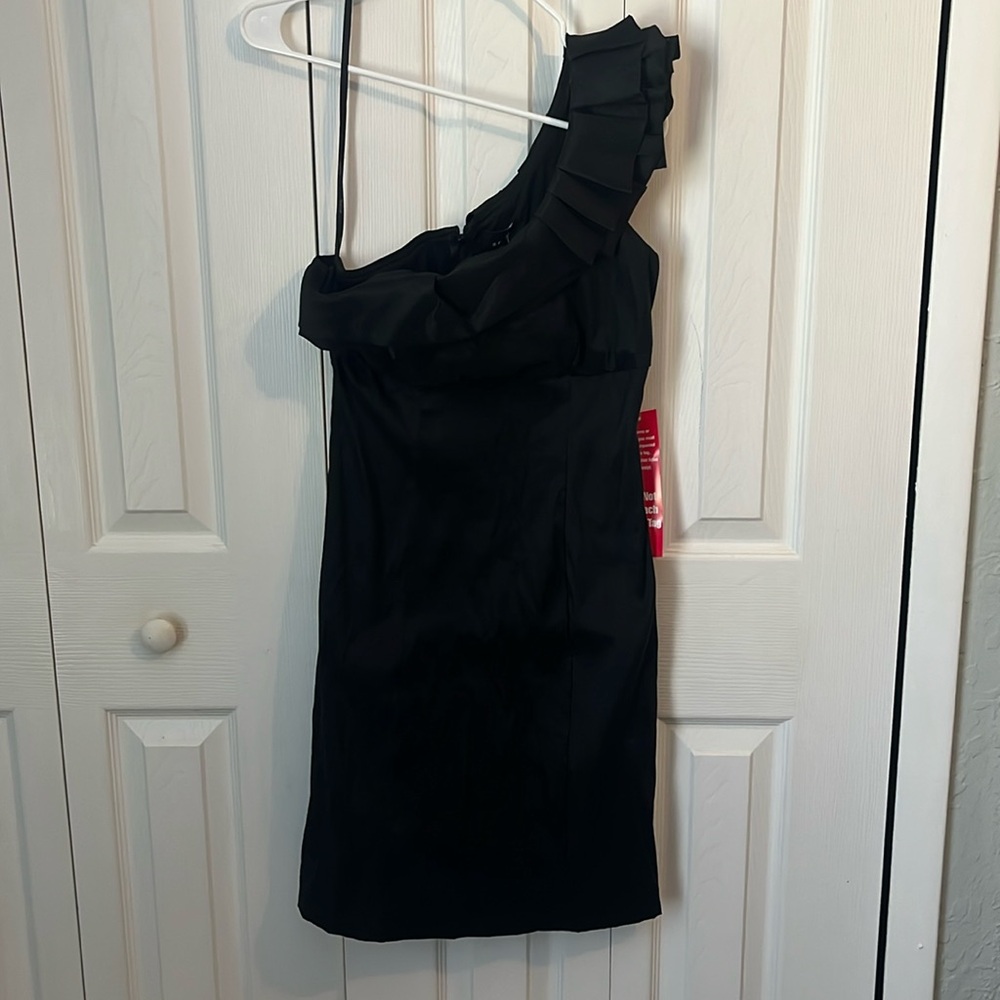 Black one-shoulder cocktail dress.